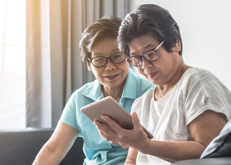 Senior women using tablet