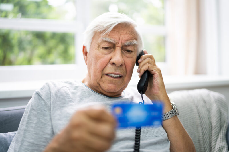senior scam targeting elderly man