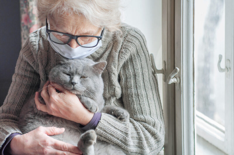 senior woman with cat
