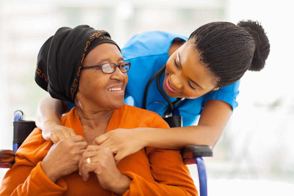 african american senior with caregiver