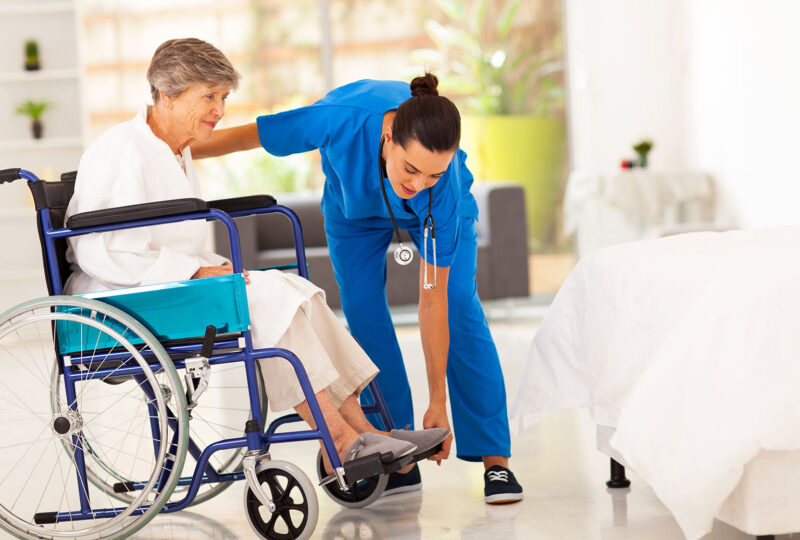 https://www.shutterstock.com/image-photo/young-caregiver-helping-elderly-woman-on-126153383