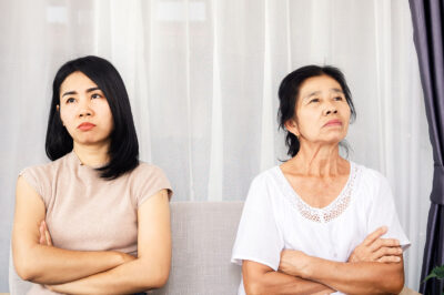 mother daughter older woman angry arms crossed