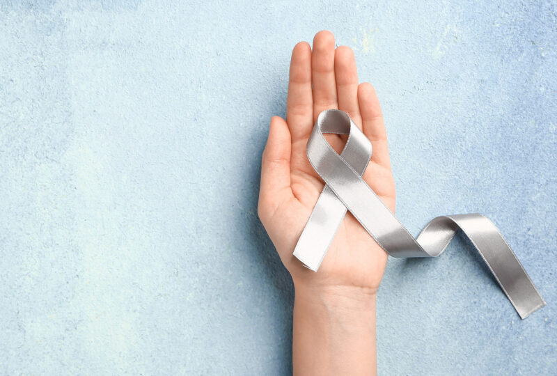 Parkinson's Disease silver awareness ribbon