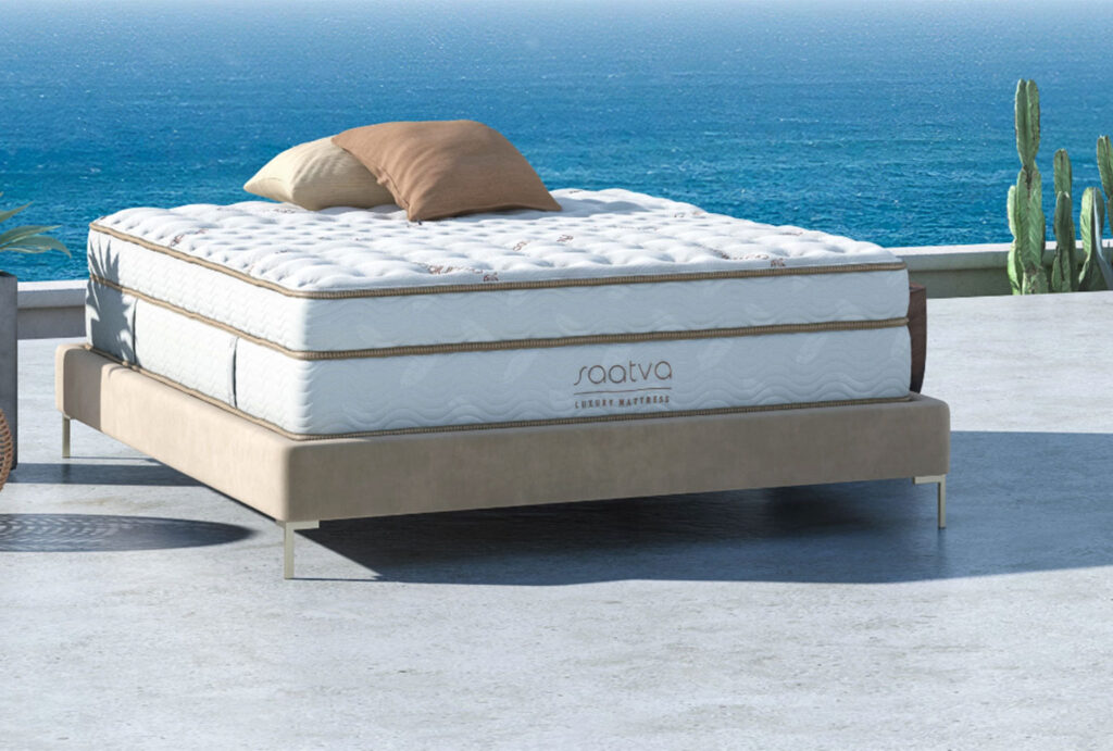 mattress on bed outside by water