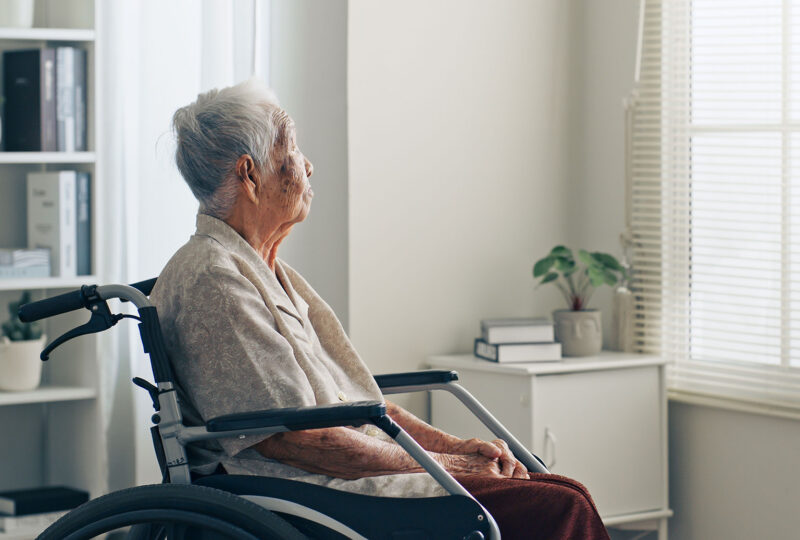older person alone in wheelchair