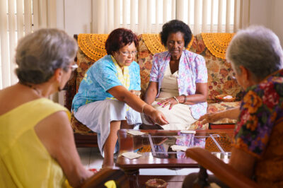 women sitting in a senior living facility