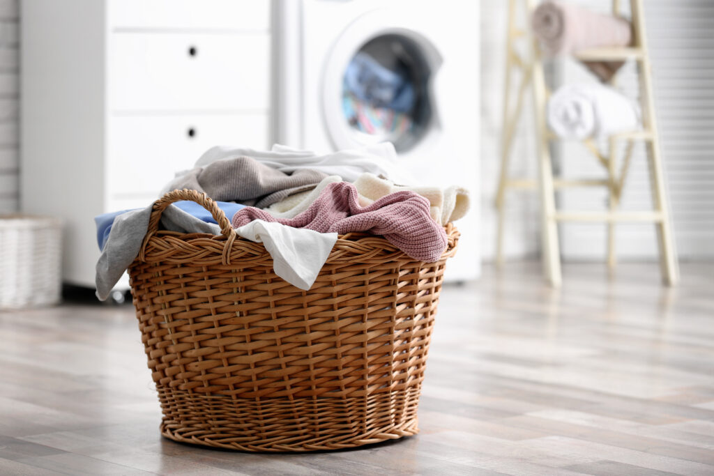 Wicker basket with dirty laundry