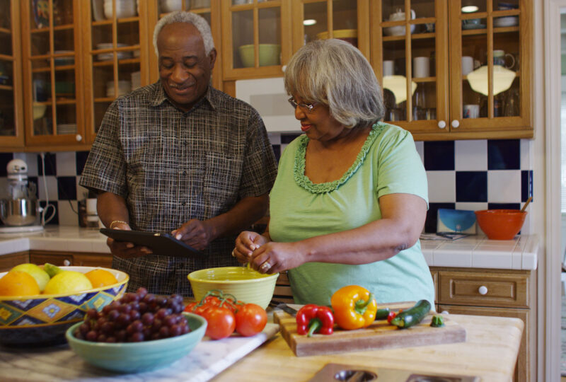 older couple cooking in the kitchen