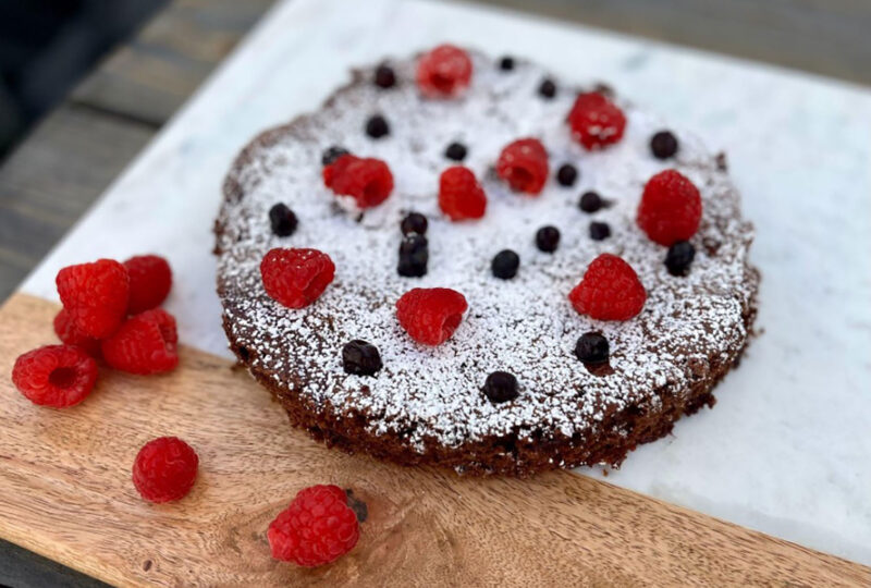 blueberry brownie pie with raspberries