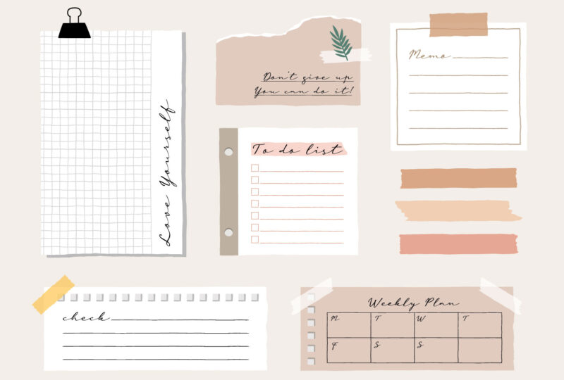A collection of striped notes, blank notebooks, and torn notes used in a diary or office.