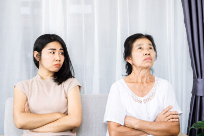 mother angry and ignoring her young daughter, daughter tired with annoyed mom quarrel in family concept