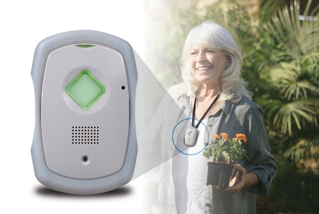 Older woman wearing Personal Safety Monitoring Service with close up of device to left